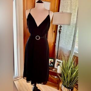 New with tags Row A chiffon dress with rhinestone belt.